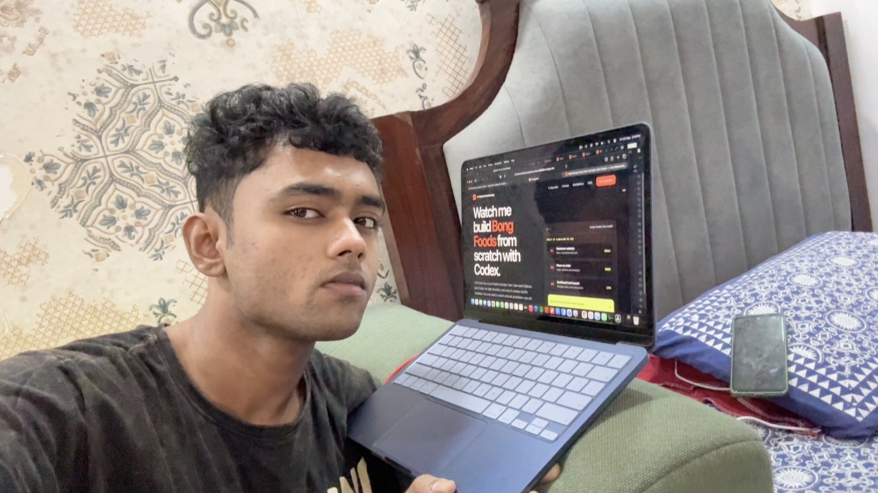Sohan working on a MacBook with a Bong Foods workflow on screen