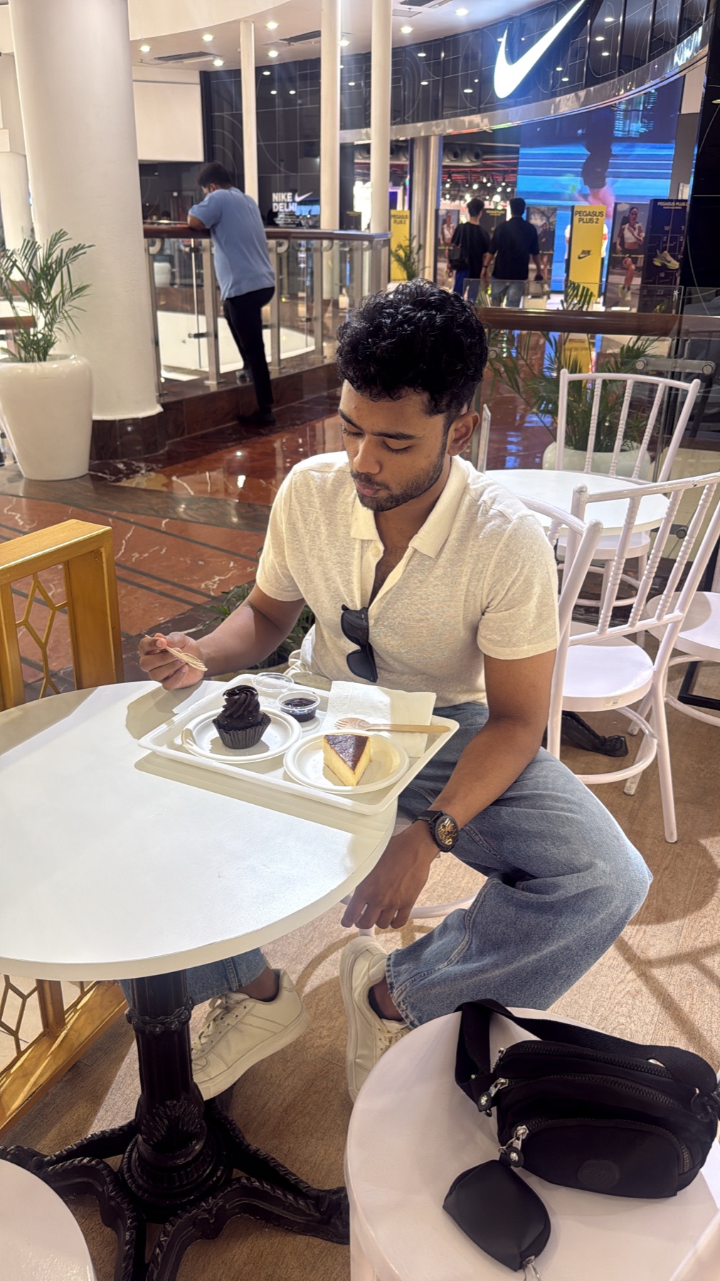 Sohan taking a break with dessert