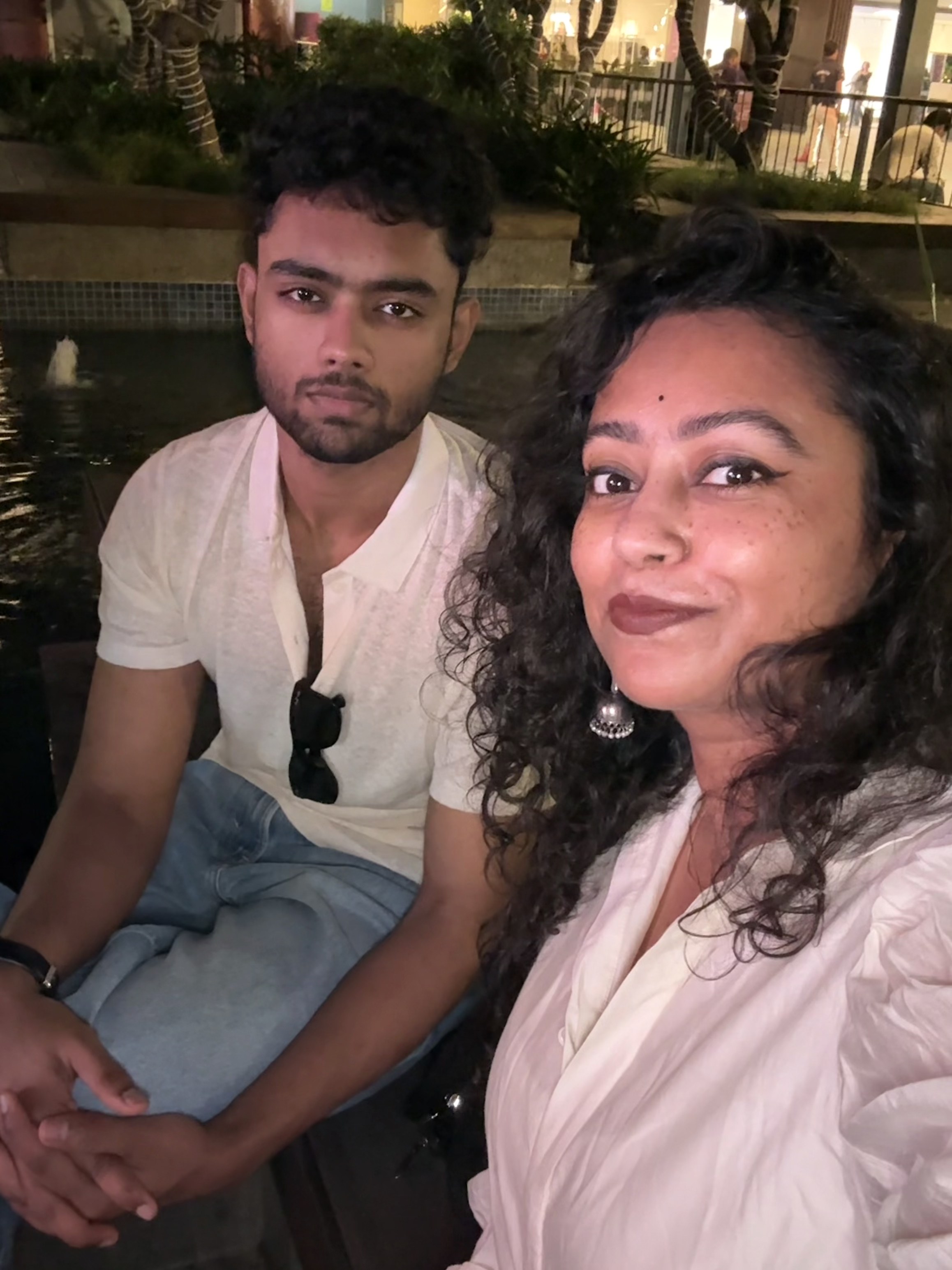 Sohan at an evening gathering with a friend